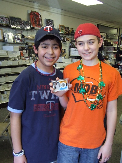 Lalo and DJ with a 2012 Topps Heritage Willie Mays coin card
